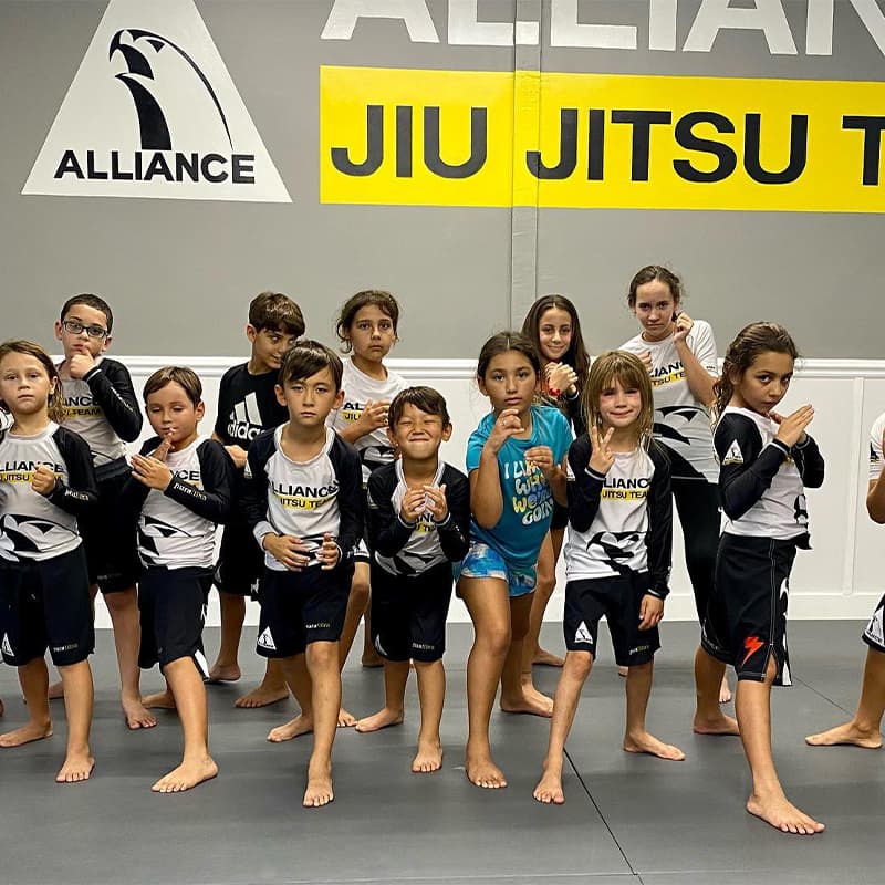 Kids Brazilian Jiu Jitsu class lined up at Rollyson BJJ in Hollywood, Florida
